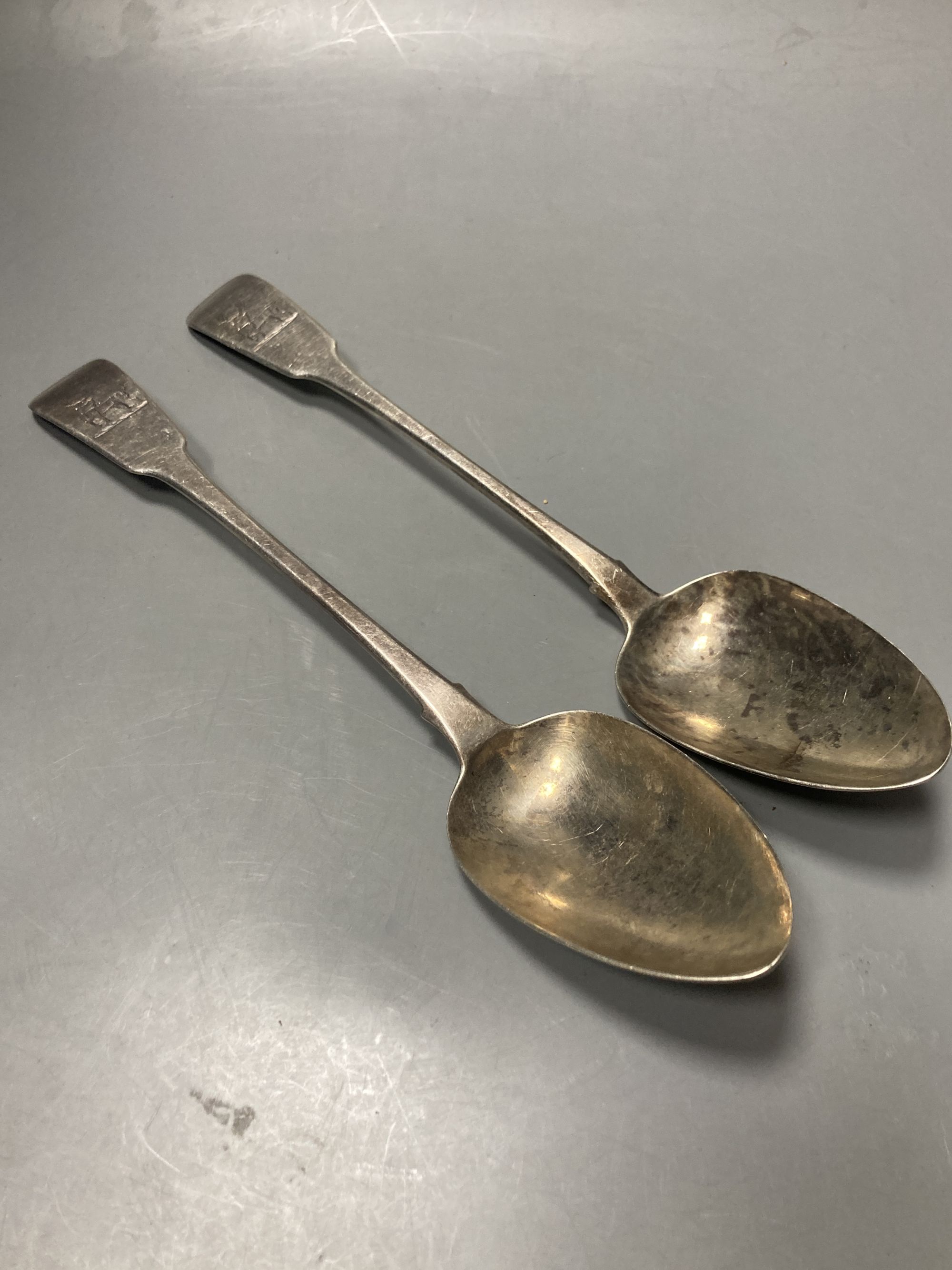 A pair of late George III Irish silver fiddle pattern table spoons, Samuel Neville, Dublin, 1816/17, 29.7cm, 7.5oz.